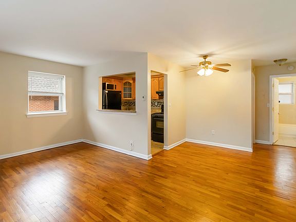 Dining Area with Hardwood Floors.