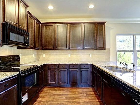 Loads of Cabinets. Photo Shown Similar to actual home for sale