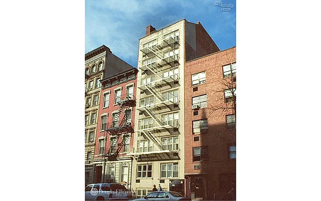 Sold by Douglas Elliman | media 13