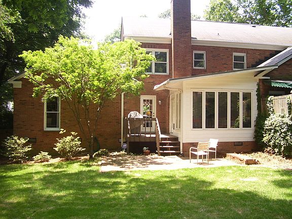 Back of house; Enloy the private back yard from the patio or the sun room.