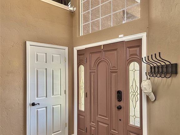 This executive Redlands home will "wow" you as you step into the vaulted two-sto