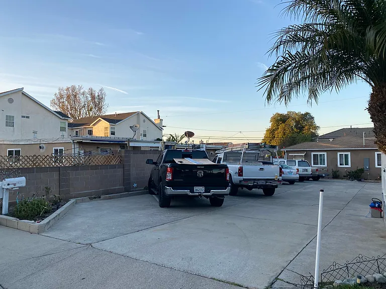 6 parking spots shared between the 2 separate houses on this property.