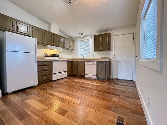Kitchen includes Refrigerator