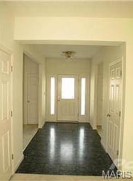 Large entry foyer with access to formal dining or living roo