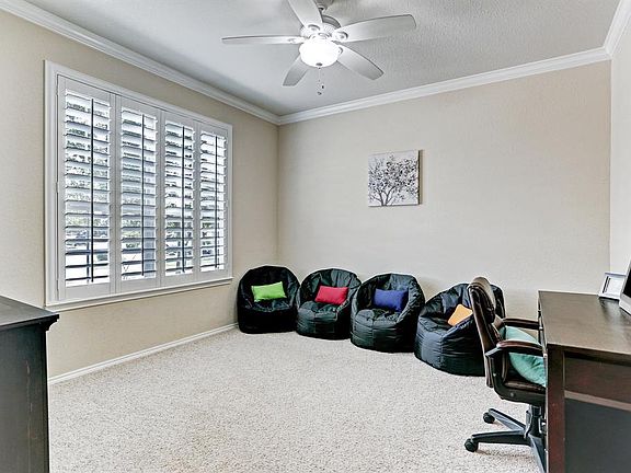 Private office/study behind french doors greets you at the entry. Great flex room could be workout room/nursery den..so many options