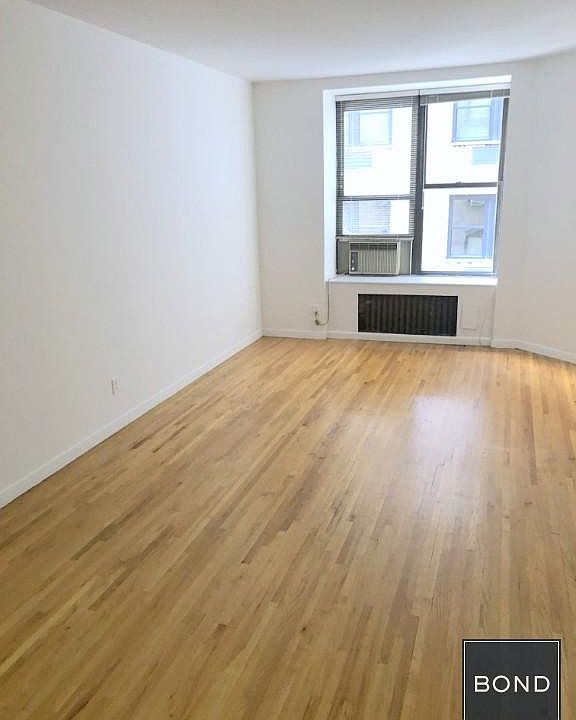 1st image of 117 W 58th St APT 4D