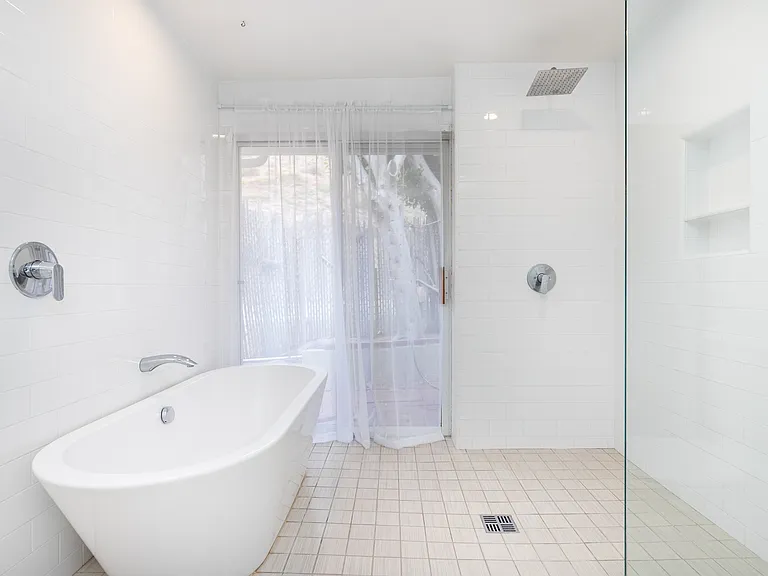 Master bathroom tub and shower.