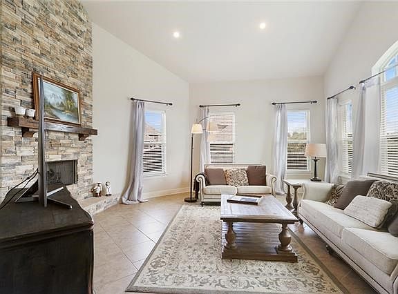 Light and Bright Family Room w/Plenty of Windows providing natural light.