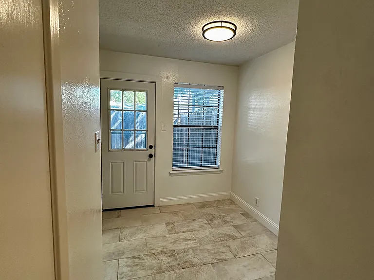 Kitchenette are door leads to the back patio.