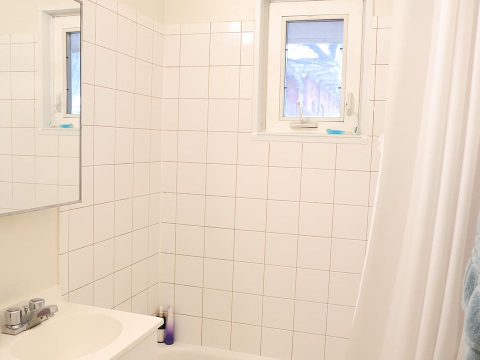 bathroom with full tub