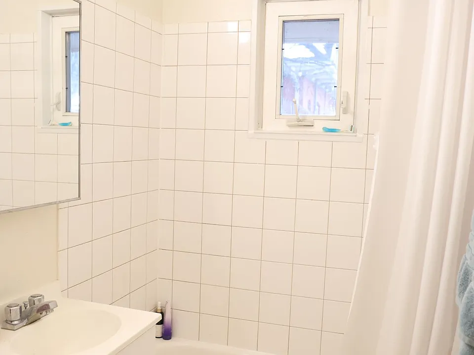 bathroom with full tub