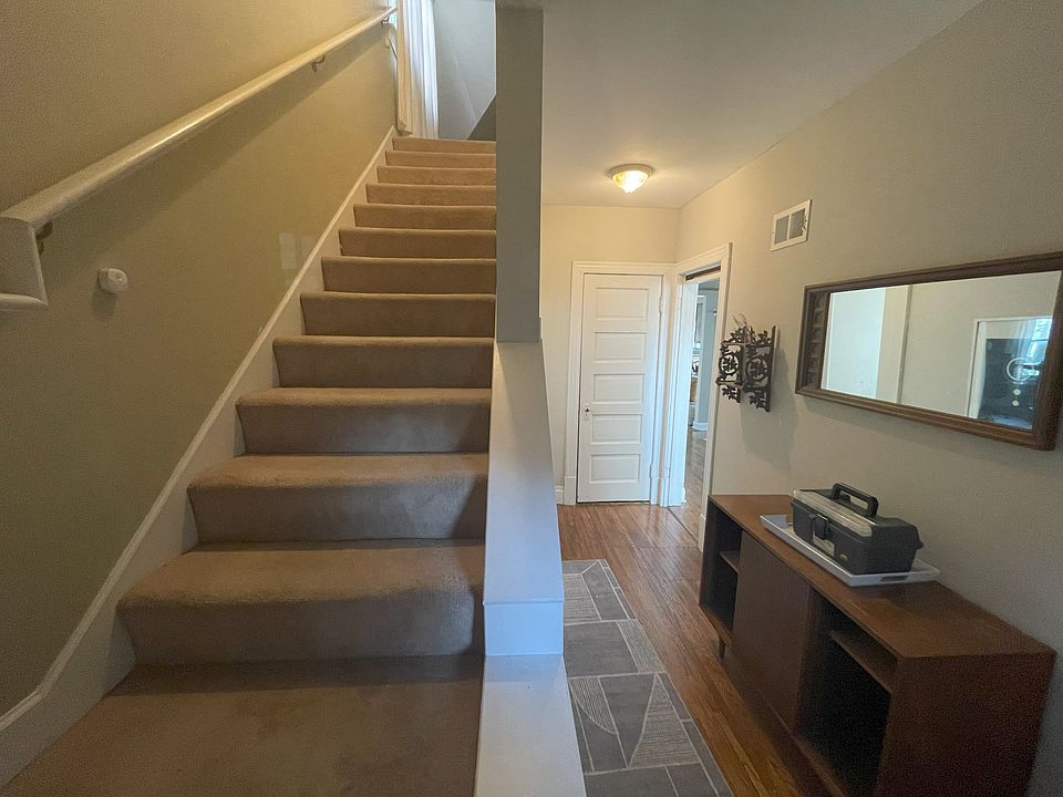 Entry and stairs to second floor bedroom.