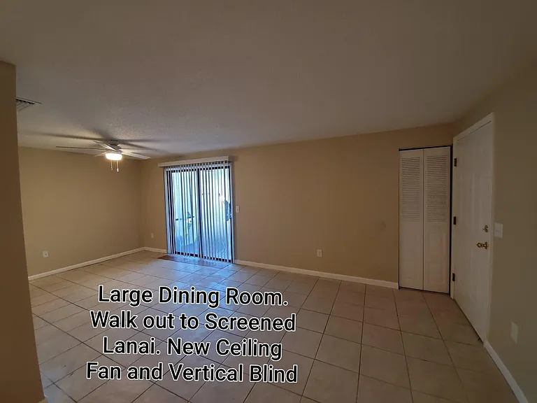 Spacious dining room/or family room with sliding glass door access to private lanai.