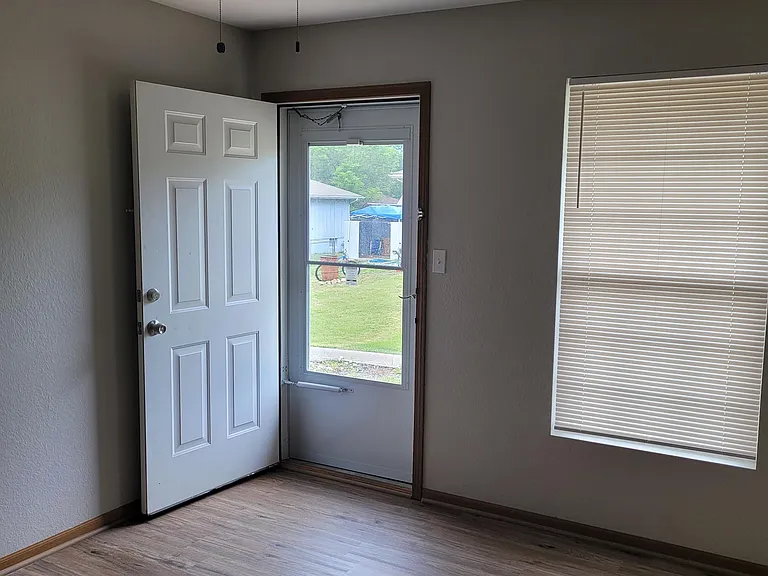 Rear door through 2nd Bedroom, to patio space.