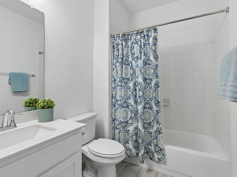 Full bath 2, located ensuite to secondary bedroom 4