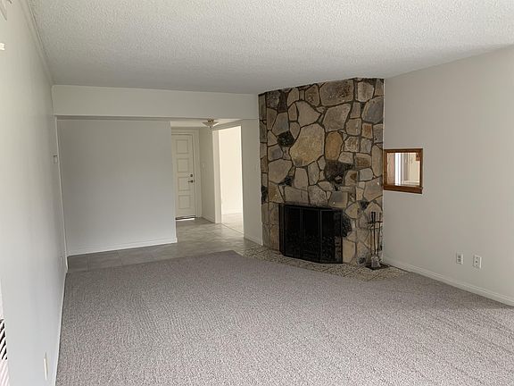 Living Room with a flagstone fireplace