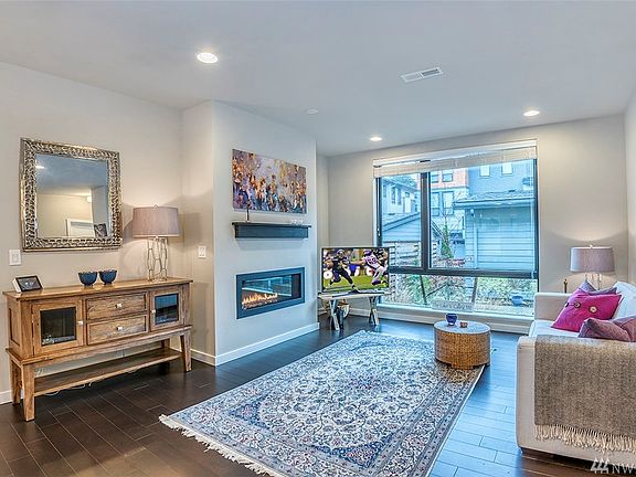 Living space with over sized window overlooking your private patio
