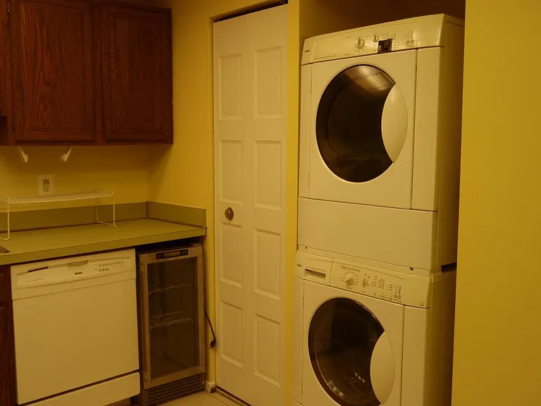 Kitchen with laundry in unit