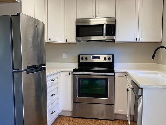 Modern kitchen with stainless steel appliances