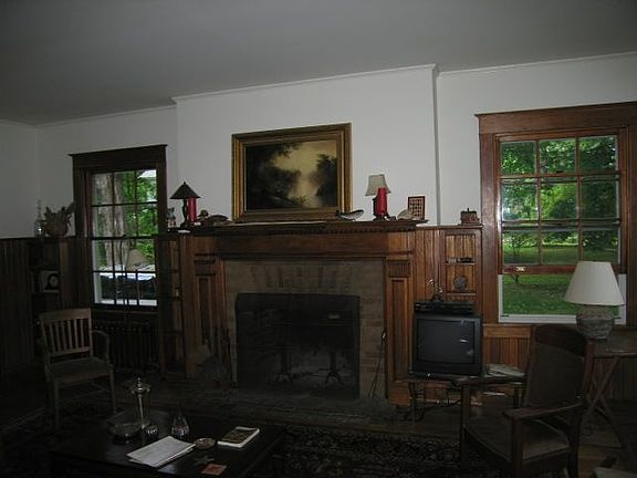 Chestnut paneling and Fireplace in Living room
