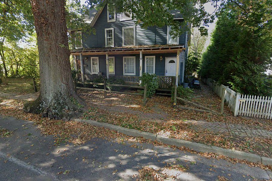 Front and side of the building. The 1st fl apartment front entrance is on the right side. The path on the right leads to the back yard and rear entrance for the 1st fl apartment as well as the entrance to the 2nd fl apartment.