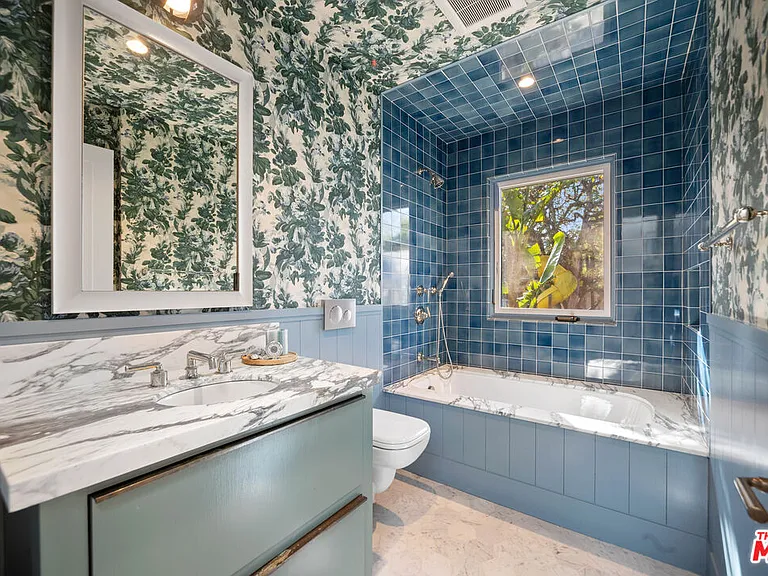 7038 Dume Dr — Photo 36