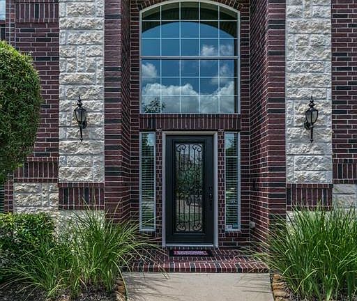 Inviting front entry with gorgeous stacked stone elevation.