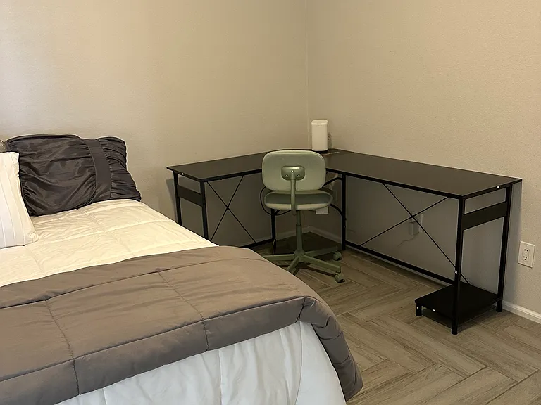 Bedroom #3 with Queen Bed and a big desk.