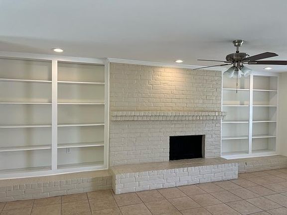 Fireplace with Built In Bookshelves