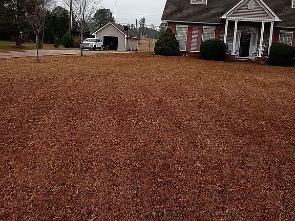 Front of home with detached workshop