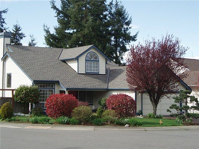 Home sits on beautifully landscaped corner lot.  New roof and tw