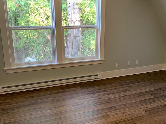 New wood floors and large windows