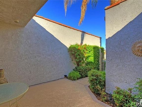 Private gated street side patio