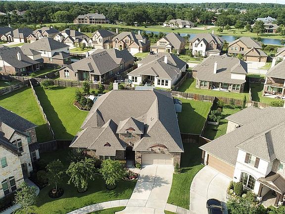 This aerial view highlights the special size and placement of this home and lot within the community.