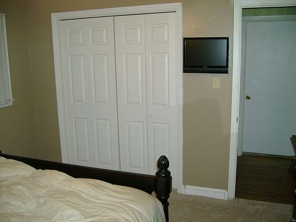 master bedroom closet and tv