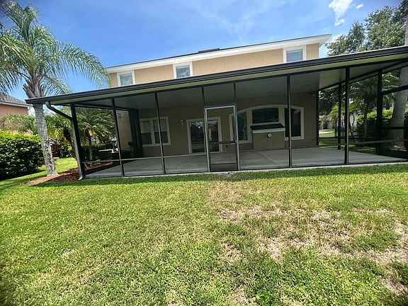 screened in lanai with brand new concrete slab