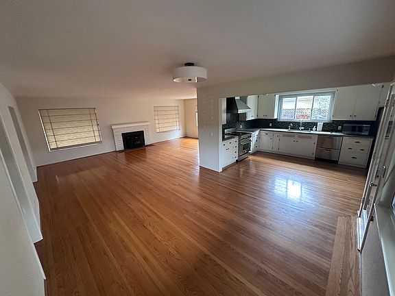 Open floorplan common area, including view of kitchen
