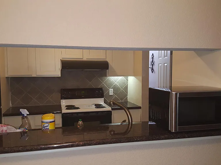Kitchen from the dining room ...Pass window