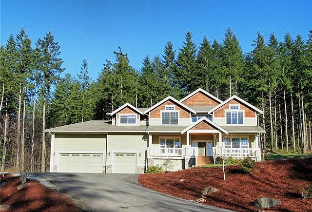 Stunning Craftsman home set up high to maximize Olympic Mountain