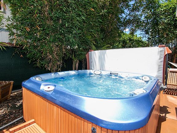 Relax in your Jacuzzi hot tub after a day at the beach!