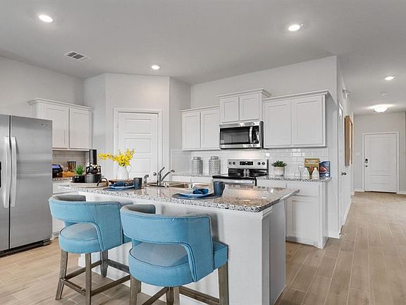 Kitchen - All Home and community information, including pricing, included features, terms, availability and amenities, are subject to change at any time without notice or obligation. All Drawings, pictures, photographs, video, square footages, floor plans, elevations, features, colors and sizes are approximate for illustration purposes only and will vary from the homes as built.