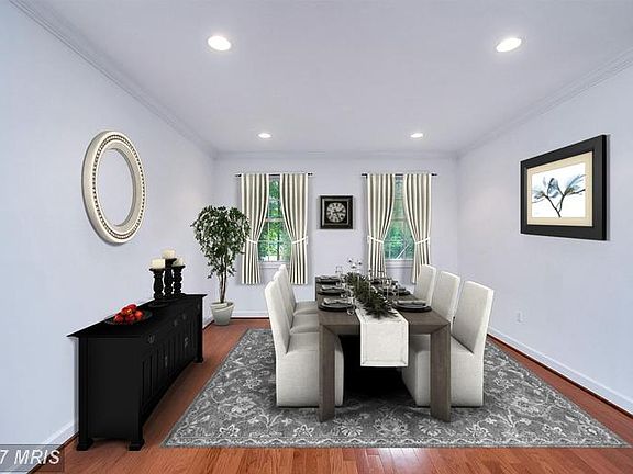 Virtually staged dining room/living room