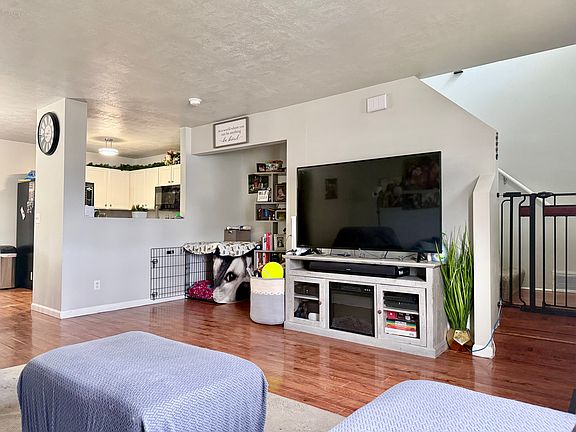Living room with mahogany wood flooring