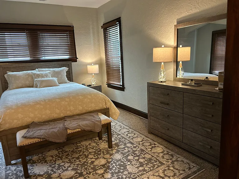The dresser has 6 pull out drawers for all your clothes but directly across the room is a large walk in closet with additional pull out drawers and room to hang additional pieces.