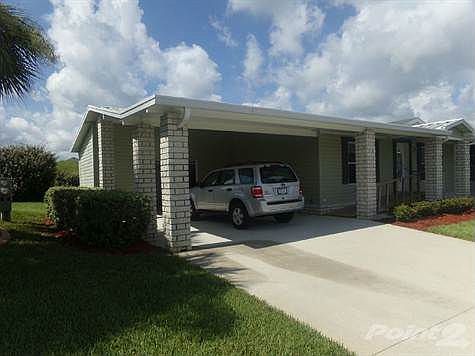 EAST SIDE OF HOME WITH DOUBLE DRIVEWAY
