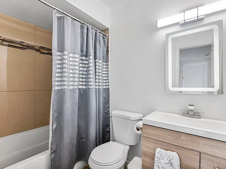 Full bath mid hallway