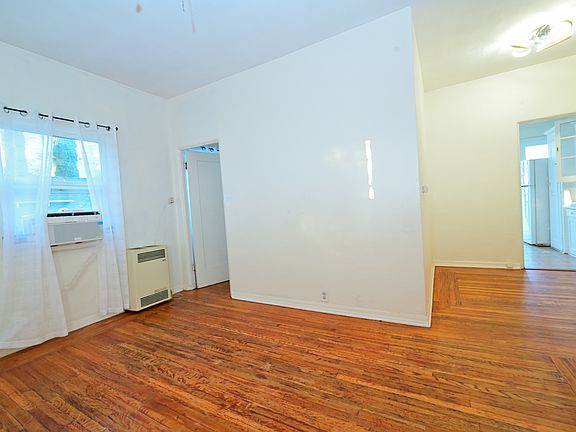 BRIGHT and charming living room and small dining area
