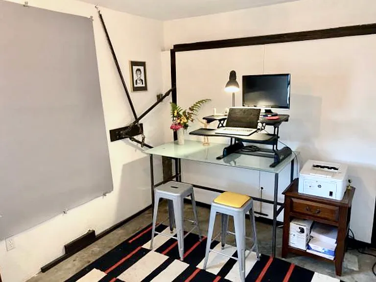 Garage/Studio shown furnished to illustrate its flexible use.