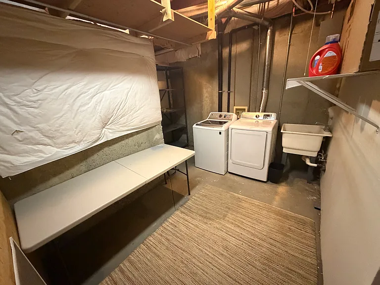 Laundry room with in unit washer / dryer