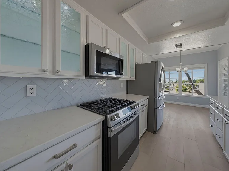 4591 Warner Ave #205 — Photo 22